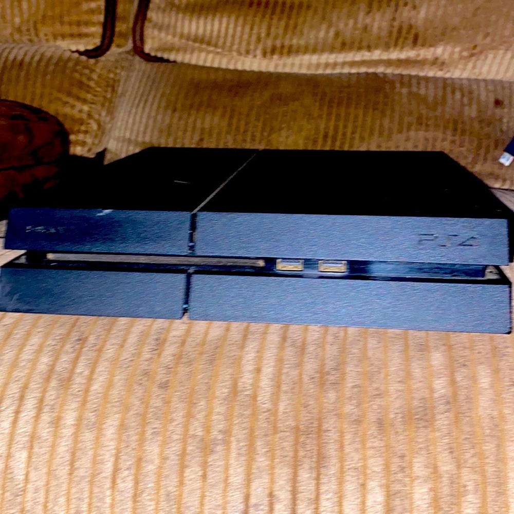 PS4 brand new only been used twice since bought